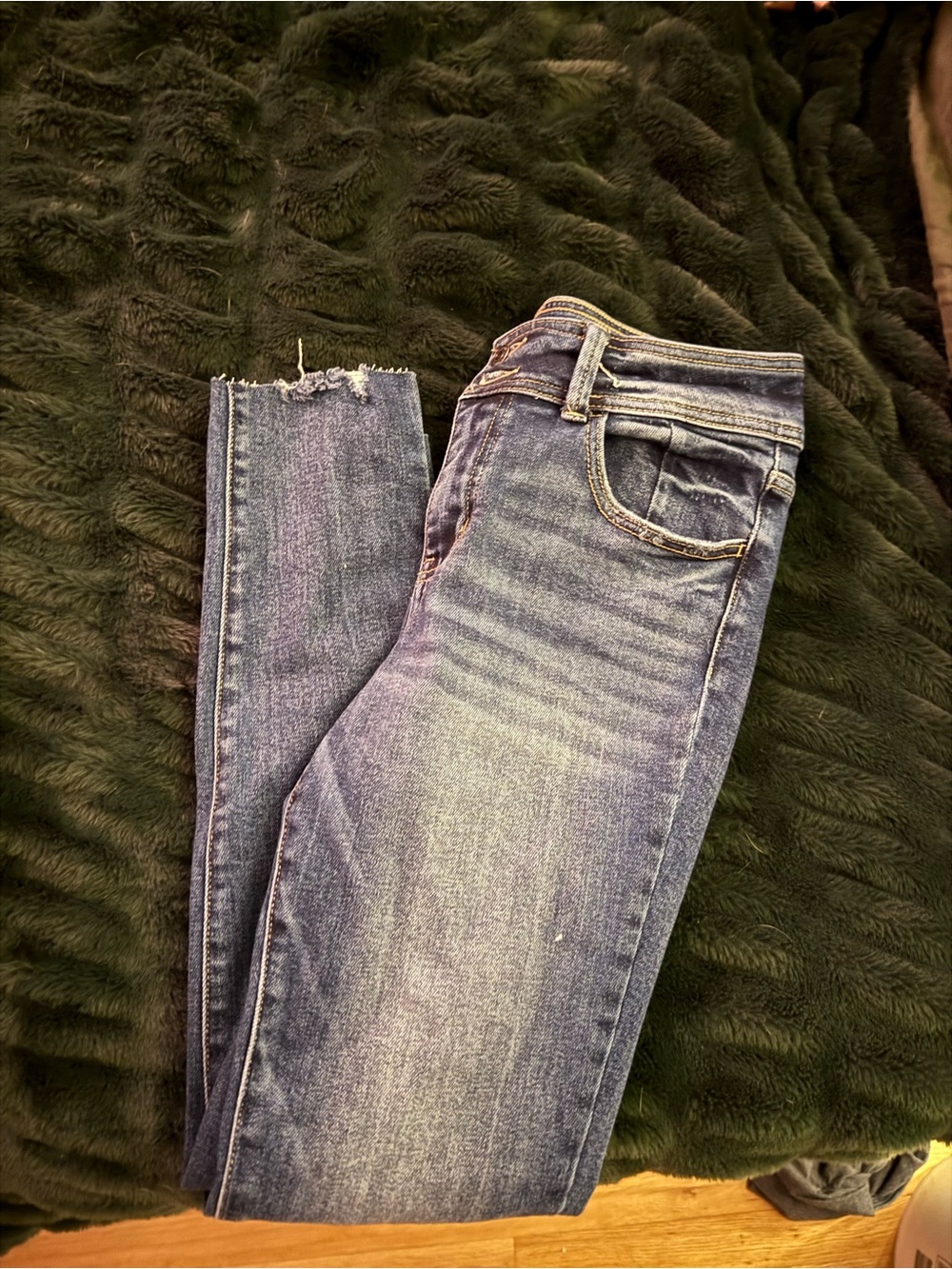KanCan Women's Skinny Jeans in Faded Blue with Distressed Hem